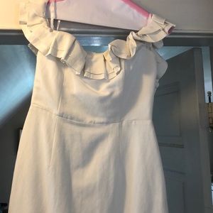 by the way. White mini ruffle dress